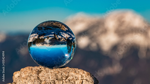 Crystal ball alpine winter landscape shot at the famous Predigtstuhl, Bad Reichenhall, Bavaria, Germany © Martin Erdniss