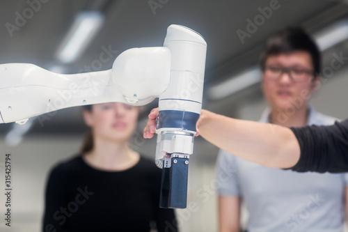 Sudents studying robotic at an university institute