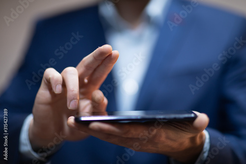 man hand phone and touching in empty screen