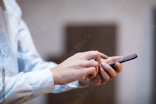 man hand phone and touching in empty screen