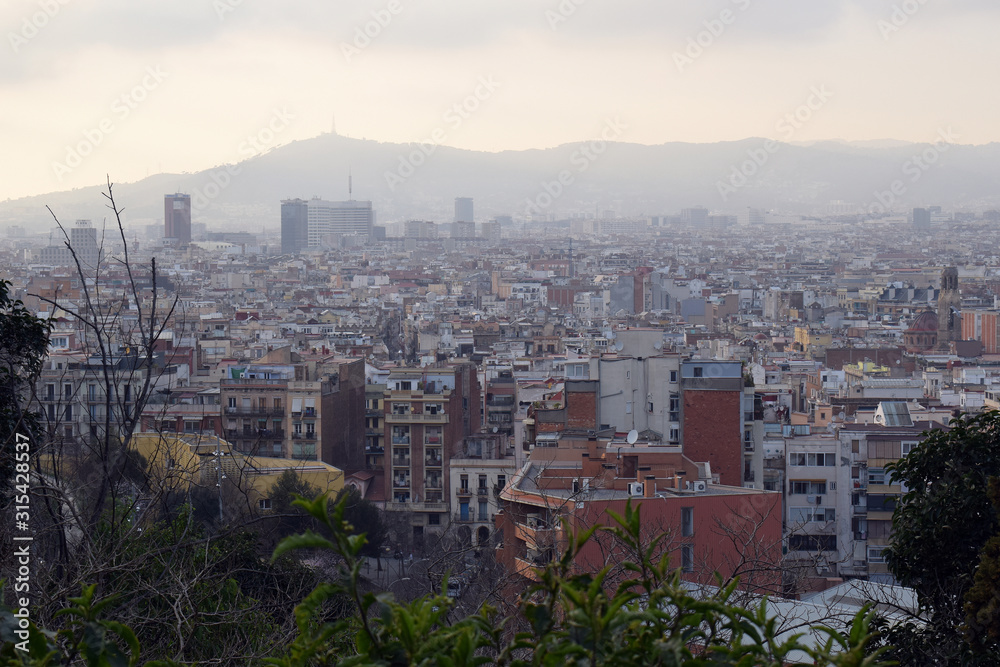 Hazy View over Barcelona City Skyline 