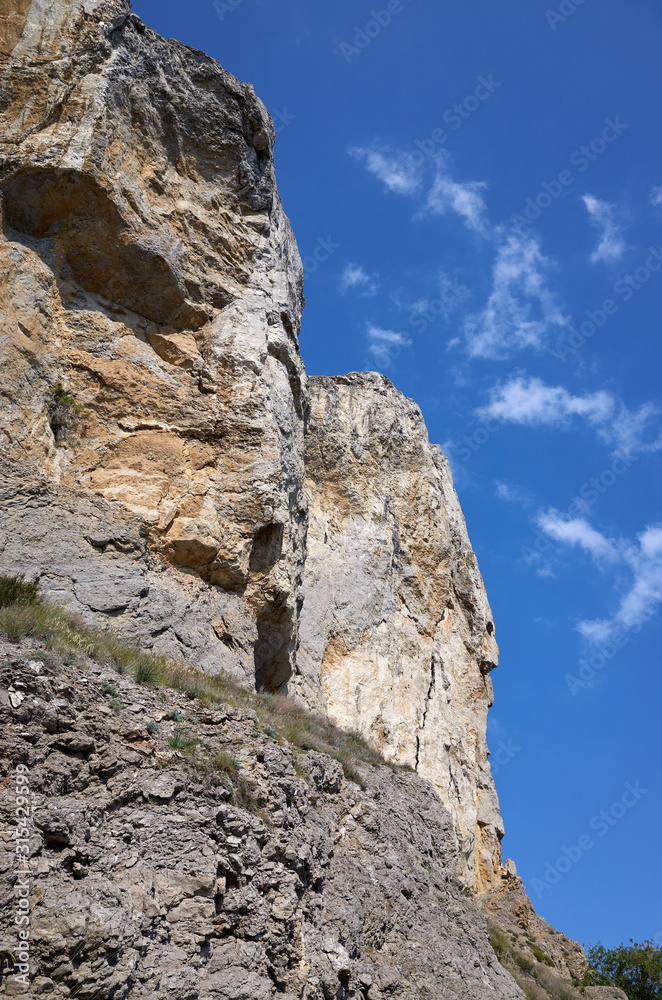 The rocky coast of the Black Sea. Cape Alchak in Sudak, Crimea The rocky coast of the Black Sea. Cape Alchak in Sudak, Crimea