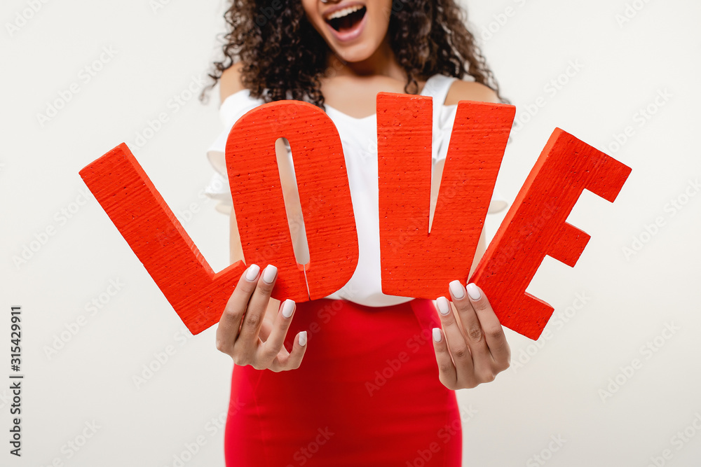 red love letters in hands of black woman isolated on white background red love letters in hands of black woman isolated on white background