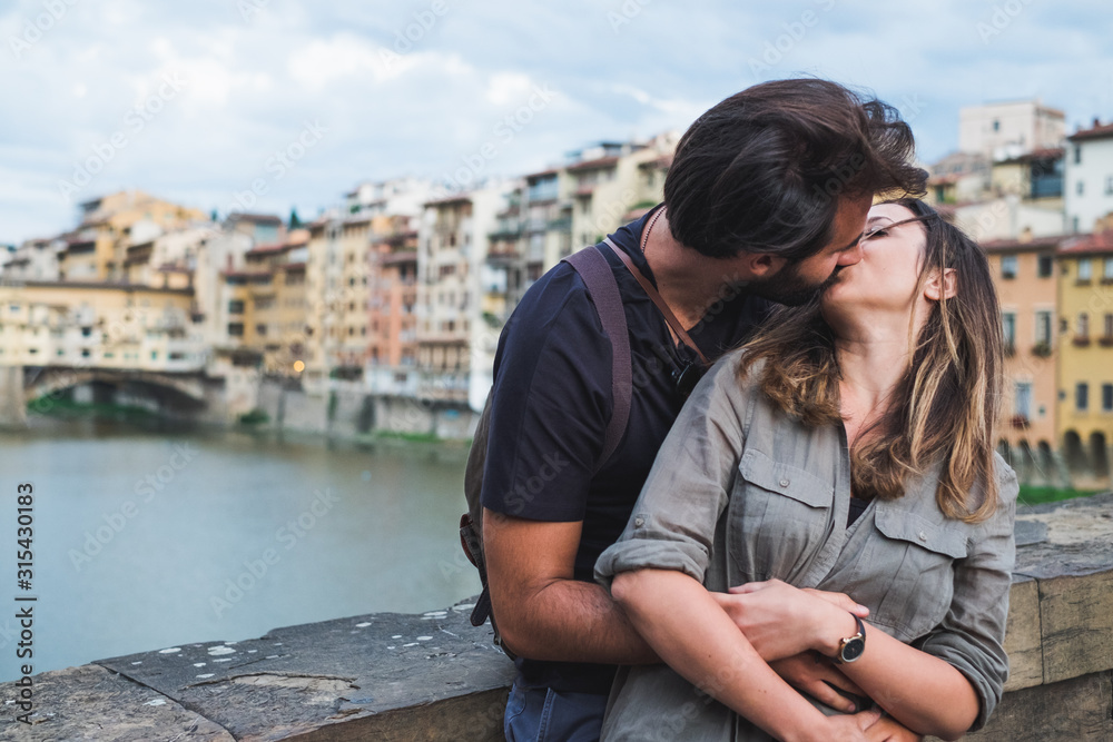 Young Couple In Front of Ponte Vecchio. Florence