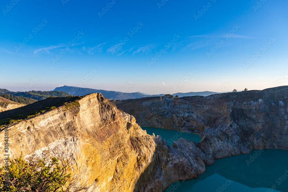 Kelimutu crater lake in the morning. Sunlights on the. Moni, Flores, Indonesia.