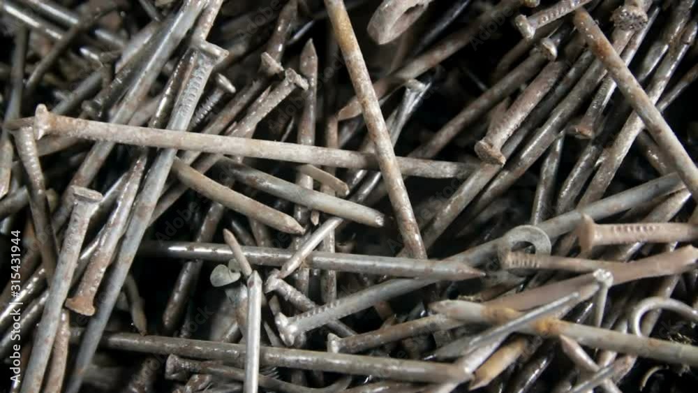 Rusty metal nails, screws, nuts, dowels, washers Rusty metal nails, screws, nuts, dowels, washers