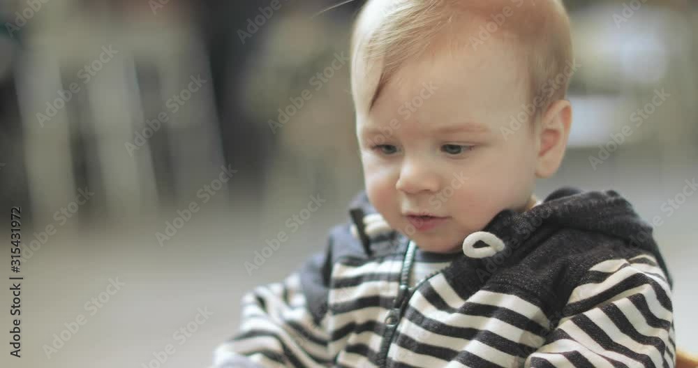 Baby boy in the shopping mall Baby boy in the shopping mall