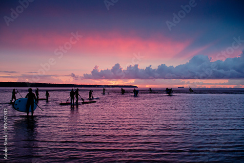 Sappersurfs sail in the sunset on the Baltic Sea