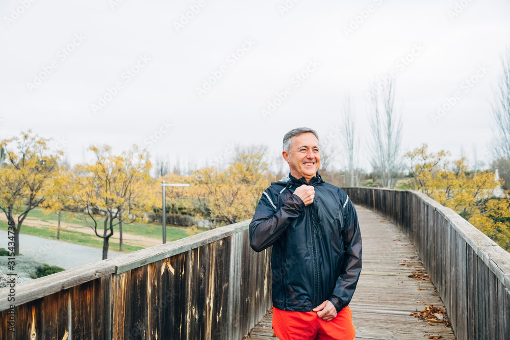 Fototapeta premium Senior man preparing to do sports