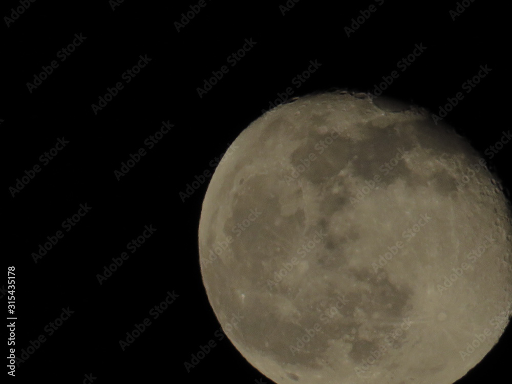Obraz premium Moon With Clouds In The Night Sky. Concept of a spooky theme and mystery.
