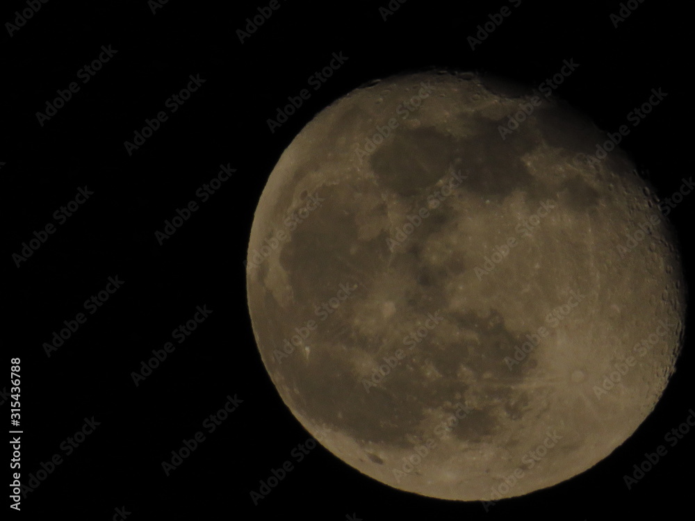 Moon With Clouds In The Night Sky. Concept of a spooky theme and mystery. Moon With Clouds In The Night Sky. Concept of a spooky theme and mystery.