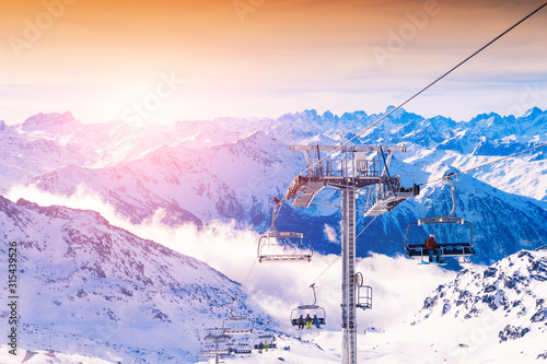 Obraz na płótnie Ski resort in winter Alps. Val Thorens, 3 Valleys, France. Beautiful mountains and the blue sky, winter landscape w salonie