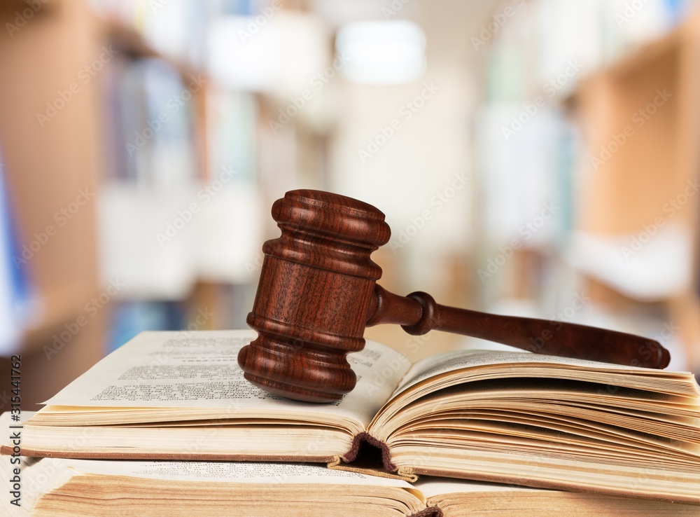 Judge hammer and documents on background Judge hammer and documents on background