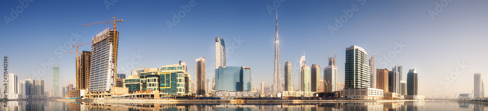 Cityscape of Dubai and panoramic view of Business bay, UAE - obrazy, fototapety, plakaty 