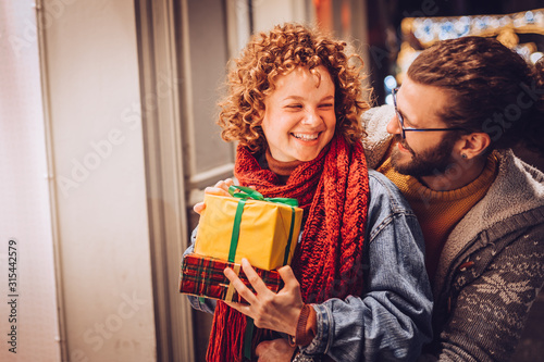 Man surprise woman for Christmas, Valentine's day, birthday