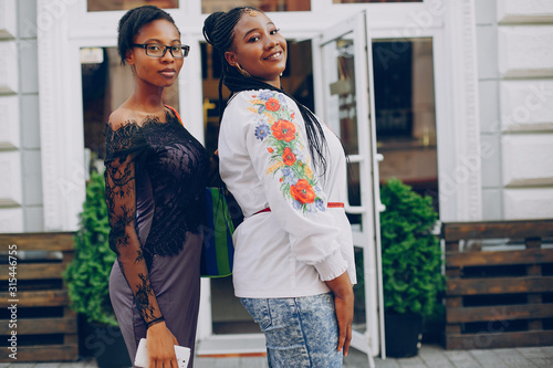 Wallpaper Mural Girls on the street. Beautiful girls. Girls walk along the streets of the city Torontodigital.ca