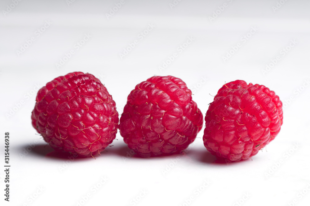 Ripe raspberries isolated on white background cutout Ripe raspberries isolated on white background cutout