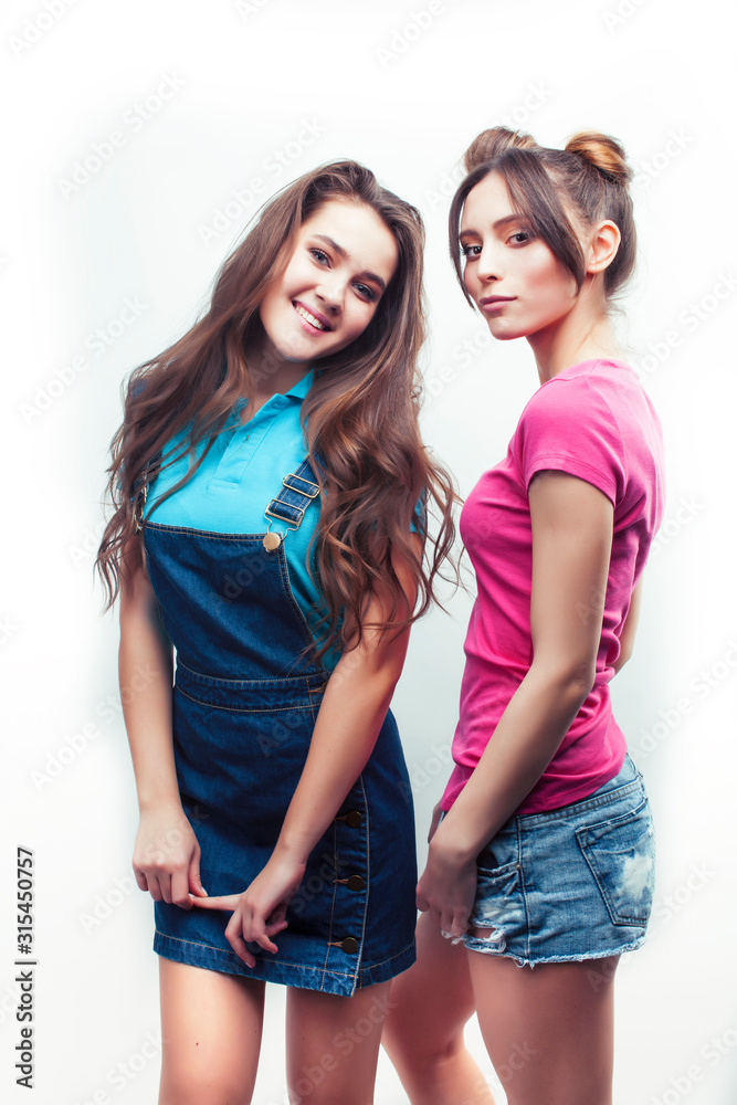 best friends teenage girls together having fun, posing emotional on white background, besties happy smiling, lifestyle people concept best friends teenage girls together having fun, posing emotional on white background, besties happy smiling, lifestyle people concept