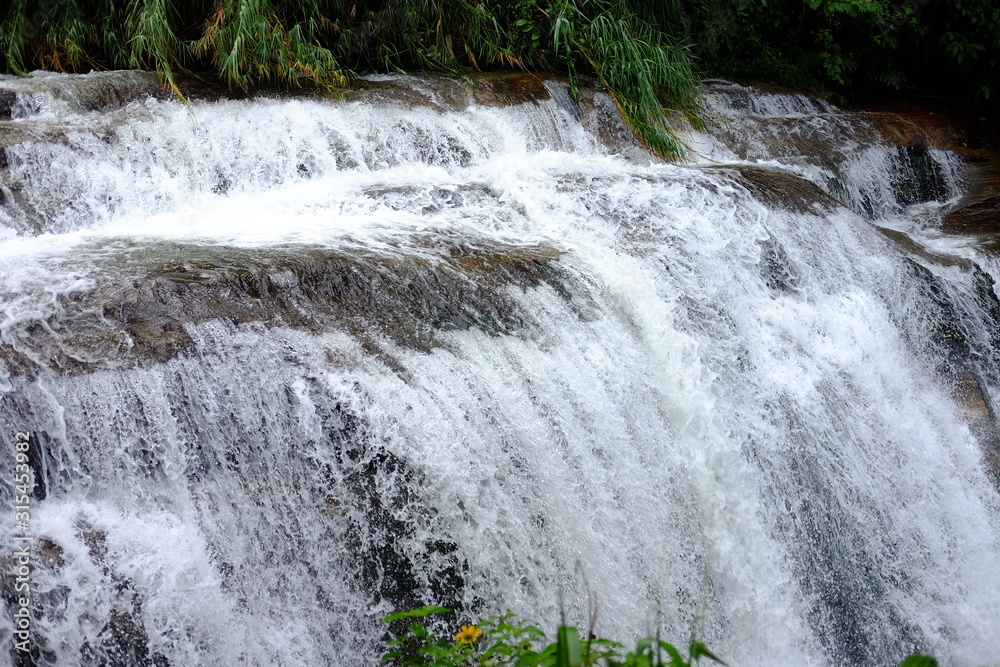 waterfall in the jungles of Indonesia waterfall in the jungles of Indonesia