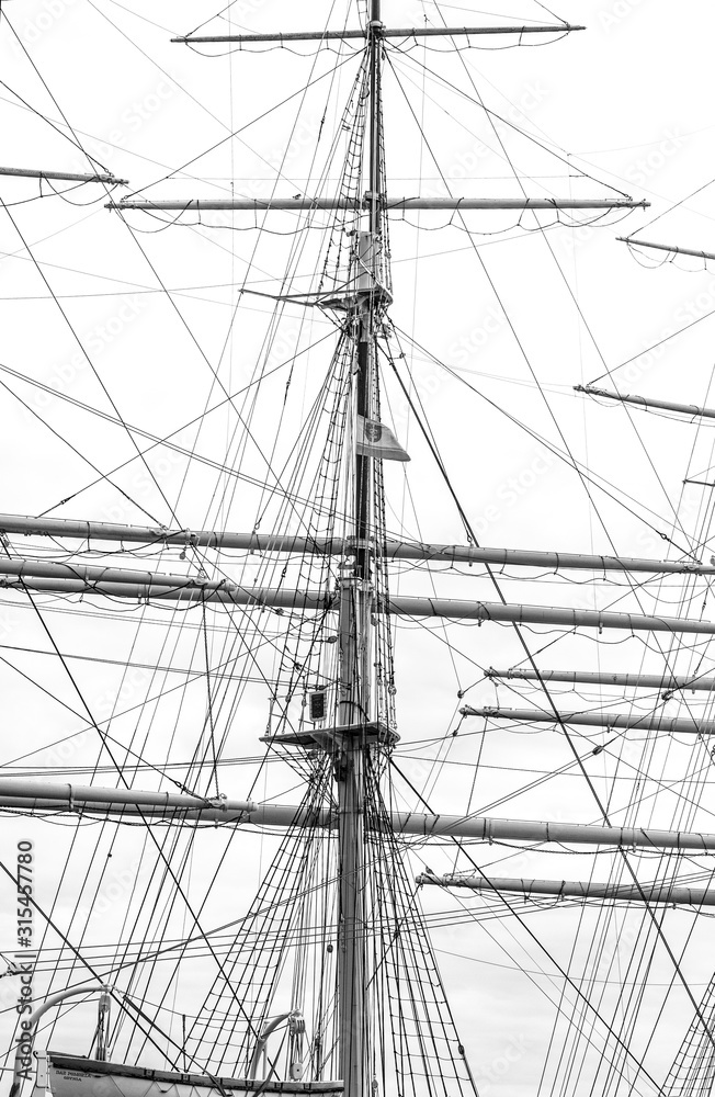 Mast with rigging of old sailing ship Mast with rigging of old sailing ship