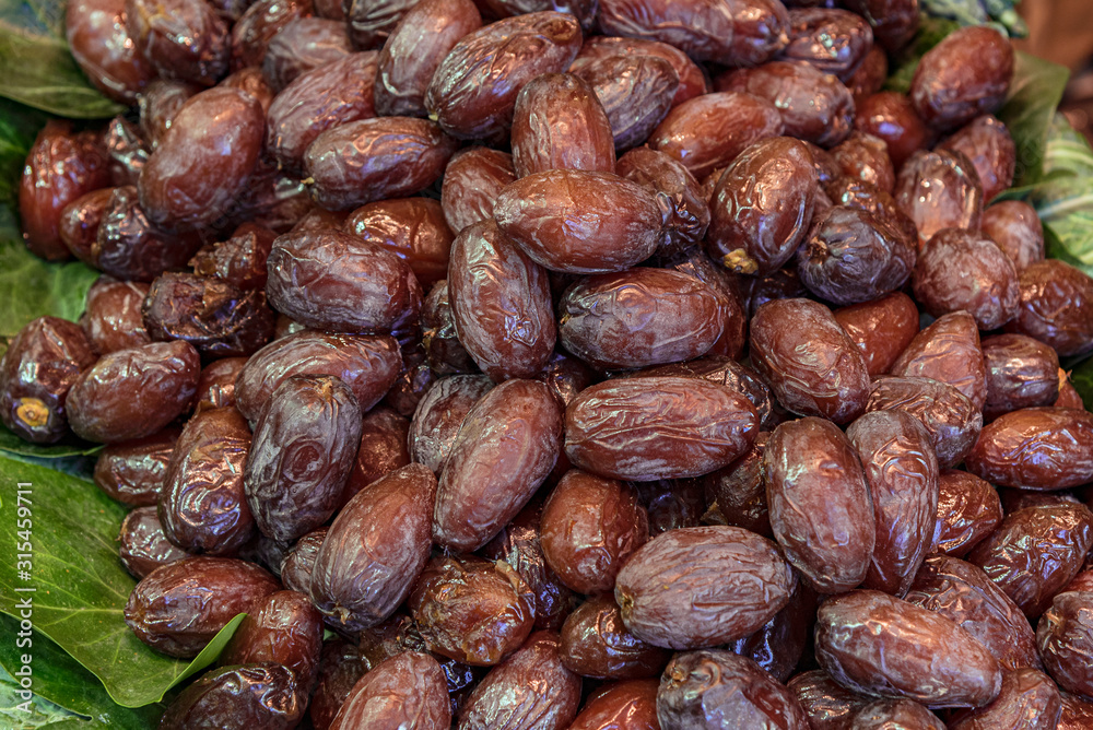 Sweet dried dates. Organic dates displayed in the market Sweet dried dates. Organic dates displayed in the market