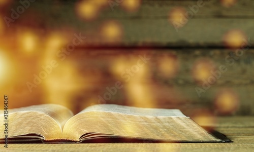 Fotografie Christian Open Bible with light illustration