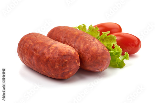 Chorizo Sausages with cherry tomatoes and lettuce, isolated on white background