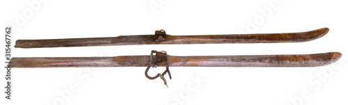 A pair of old-fashioned wooden skis isolated on a white background