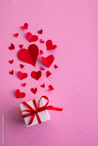 Valentine's day abstract background with paper cut decoration, flat layout