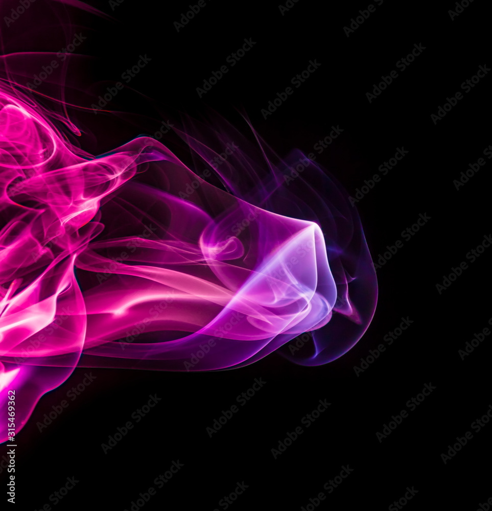 Colored smoke on black background Colored smoke on black background