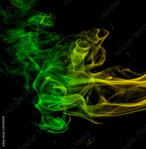 Colored smoke on black background