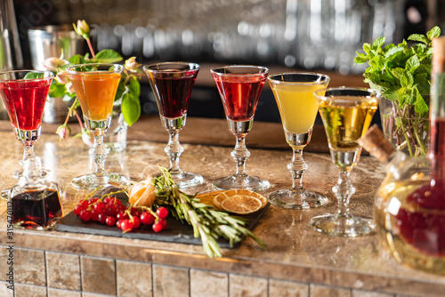 Fotografie Different Bitters And Liqueurs in the bar