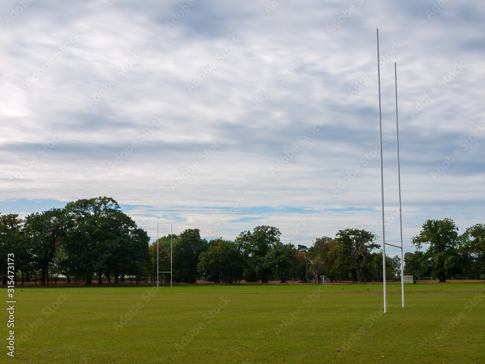 Obraz premium Outside sports field college university goal posts football rugby