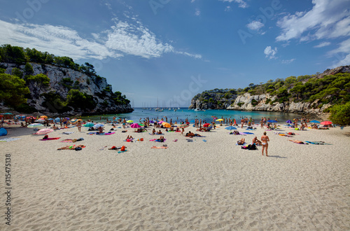 Tourists tanning in Cala Macarella in Menorca,Balearic Islands, Spain © Massimo Pizzotti