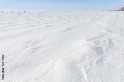 Patterns on a fresh snow texture on a field © Aron M  - Austria