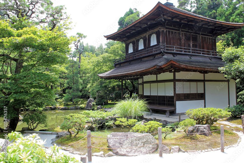 Kyoto, Japan - July 16, 2019: Ginkaku-ji, also known as Temple of the Silver Pavilion, is a Zen temple with gardens Kyoto, Japan - July 16, 2019: Ginkaku-ji, also known as Temple of the Silver Pavilion, is a Zen temple with gardens