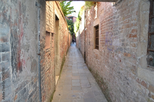 narrow street in old town of venice © luisa