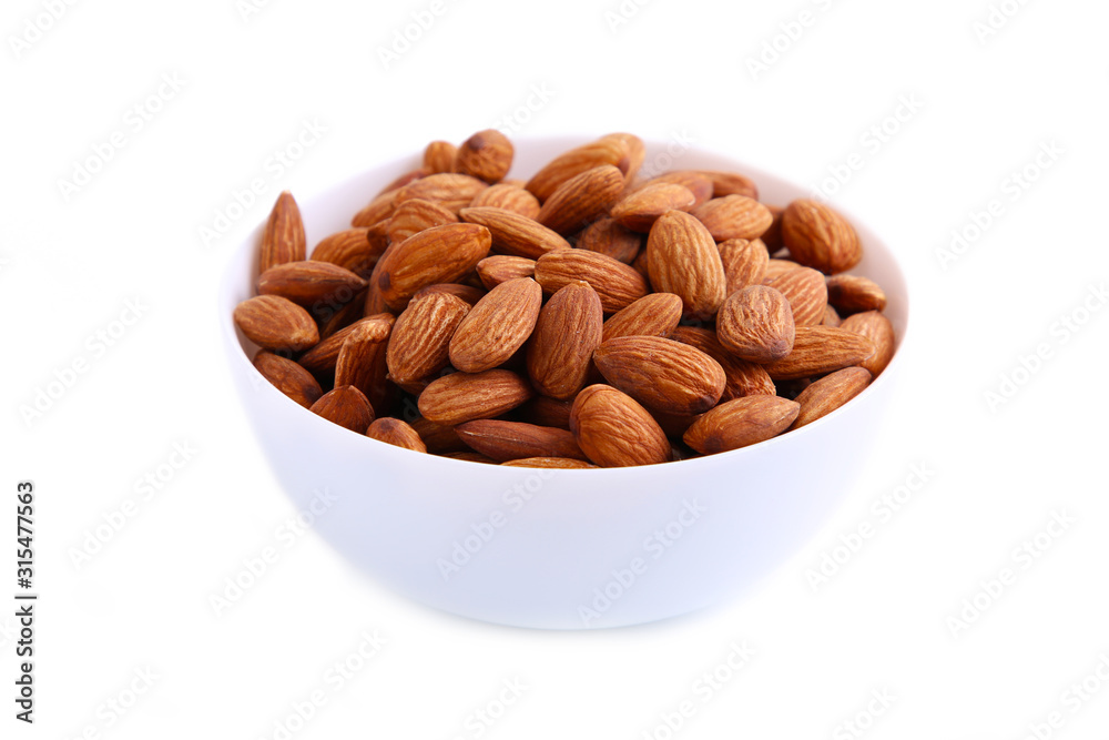 White bowl of almonds isolated on white background White bowl of almonds isolated on white background