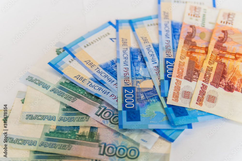 Scattered ruble currency banknotes, closeup view Scattered ruble currency banknotes, closeup view