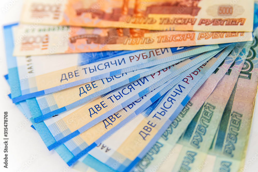 Scattered ruble currency banknotes, closeup view Scattered ruble currency banknotes, closeup view