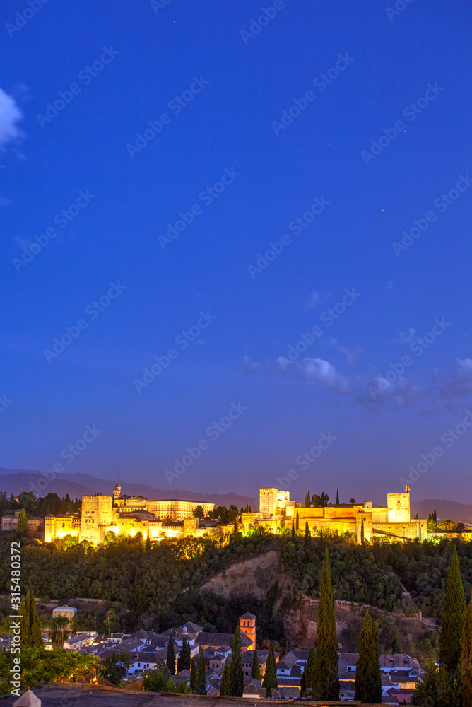 Panoramic view of the Alhambra with Sierra Nevada in the background, Granada, Andalusia, Spain Panoramic view of the Alhambra with Sierra Nevada in the background, Granada, Andalusia, Spain