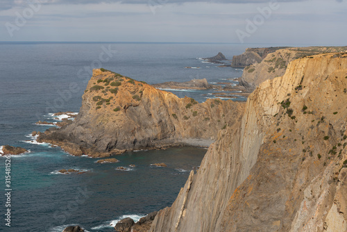 Praia da Arrifana beach sea cliffs in Costa Vicentina, Portugal