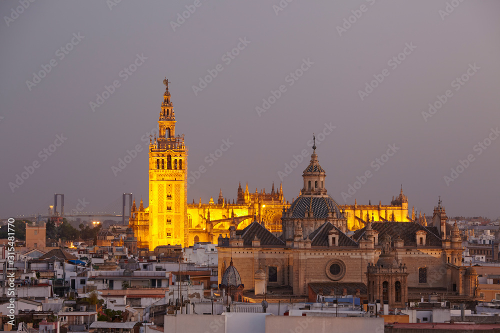 The cathedral Saint Mary of the See at dusk, seen from the top of  the Metropol Parasol, Seville, Spain