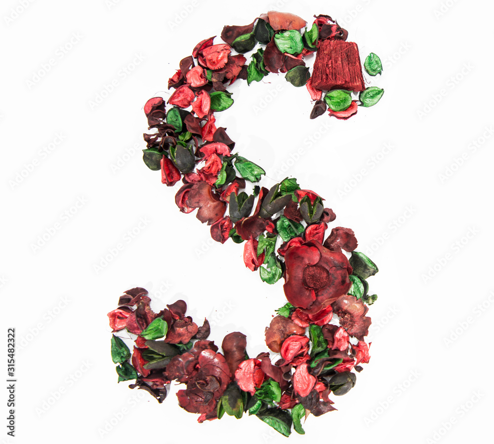 Latin alphabet letter made from dry rose flowers.