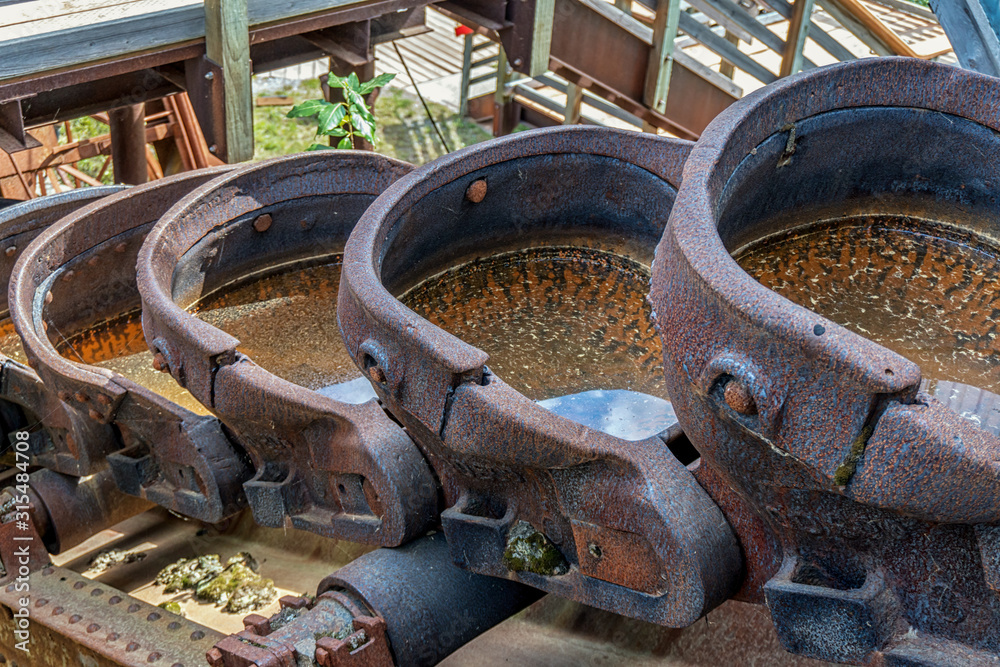 Old gold mining equipment in Alaska. From the Klondike gold rush times. Old gold mining equipment in Alaska. From the Klondike gold rush times.