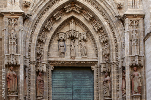 Detail of the portal of the cathedral Saint Mary of the See, Seville, Spain