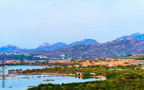 Landscape and scenery of Golfo Aranci at Costa Smeralda, Sardegna island in Italy in summer. Sassari province near Olbia and Cagliari. In Mediteranean sea. Yachts, boats and ships. Mixed media. © Roman Babakin