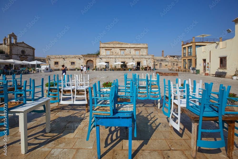 Fototapeta premium The main square of the historic village Marzamemi, Province of Syracuse, Sicily, Italy