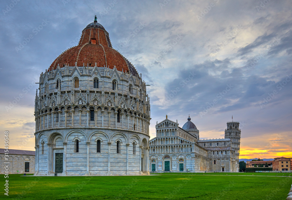 The Baptistery in the foreground, the Duomo and the leaning tower in the background, Pisa, Italy