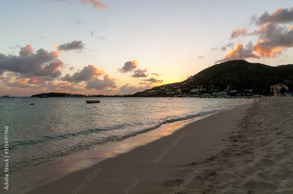 Sunset at the Great Bay beach - Philipsburg Sint Maarten ( Saint Martin ) - Caribbean tropical island.